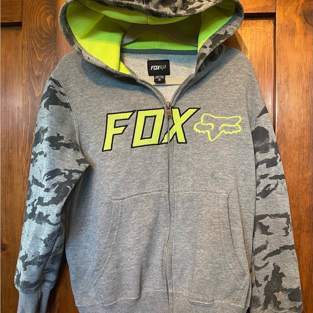 3 for $30 Fox brand zip-up hoodie with camo accents and a neon green lining.